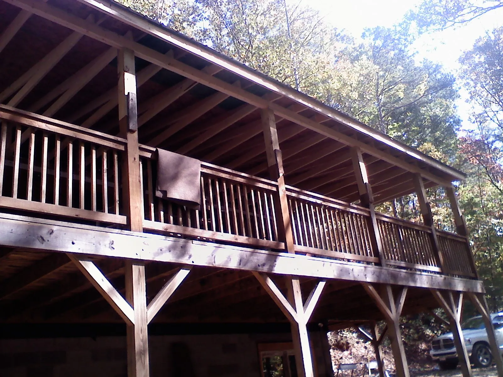Timber framing under a new elevated porch and deck — Roof Leak Repair in Swanville by Roofing Brothers